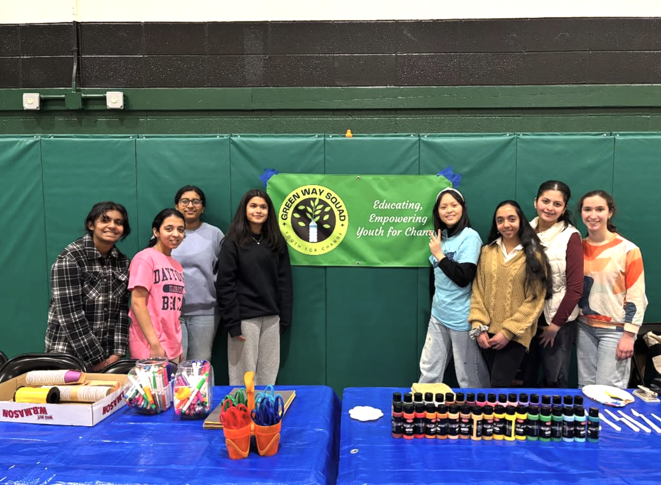Students joining hands for sustainability